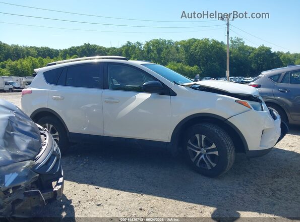 JTMBFREV3HJ130263 2017 TOYOTA RAV4 White Vista interior trasera