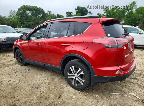 JTMBFREV3HJ135768 2017 TOYOTA RAV4 Red Rear left