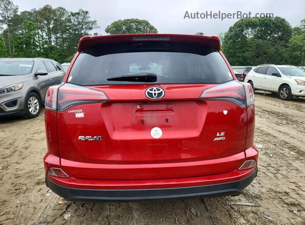 JTMBFREV3HJ135768 2017 TOYOTA RAV4 Red Rear view