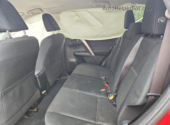 JTMBFREV3HJ135768 2017 TOYOTA RAV4 Red Rear interior view