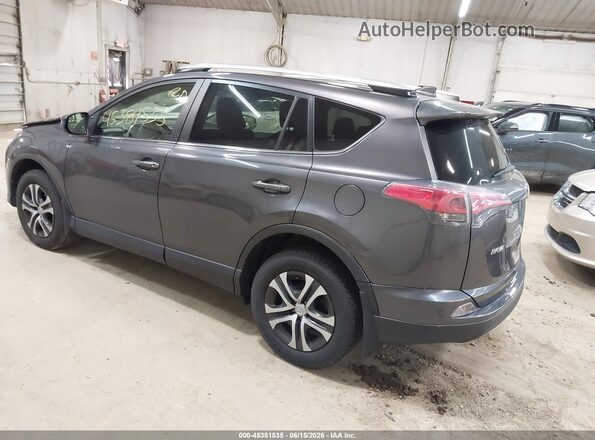 JTMBFREV3HJ166745 2017 TOYOTA RAV4 Gray Trasero izquierdo