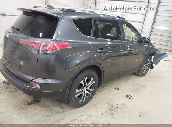 JTMBFREV3HJ166745 2017 TOYOTA RAV4 Gray Trasero derecho