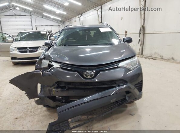 JTMBFREV3HJ166745 2017 TOYOTA RAV4 Gray Vista interior trasera
