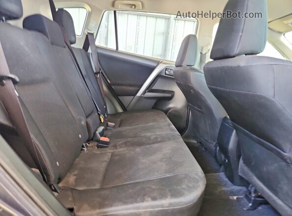 JTMBFREV3HJ173985 2017 TOYOTA RAV4 Charcoal Vista de los asientos traseros