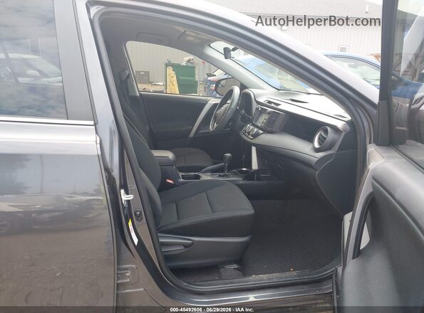 JTMBFREV3JJ225590 2018 TOYOTA RAV4 Серый Вид салона спереди