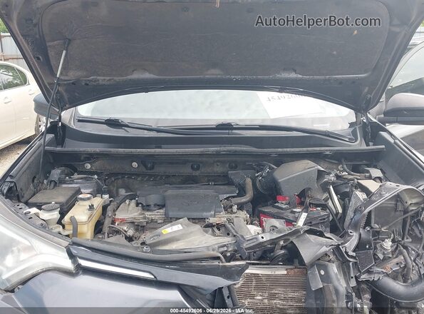 JTMBFREV3JJ225590 2018 TOYOTA RAV4 Серый Вид сзади