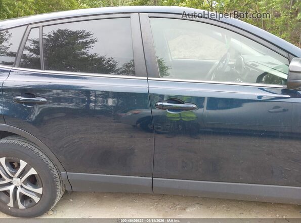 JTMBFREV3JJ236007 2018 TOYOTA RAV4 Dark Blue Widok wnętrza z tyłu