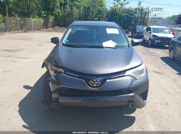 JTMBFREV3JJ248934 2018 TOYOTA RAV4 Black Սարքավորումների վահանակի տեսք