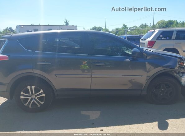 JTMBFREV3JJ248934 2018 TOYOTA RAV4 Black Սալոնի հետևի տեսք