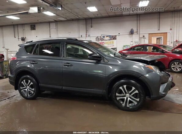 JTMBFREV4GD195023 2016 TOYOTA RAV4 Серый Вид задней части салона