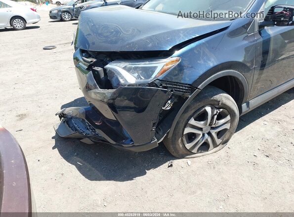 JTMBFREV4HJ145323 2017 TOYOTA RAV4 Dark Blue Vista frontal