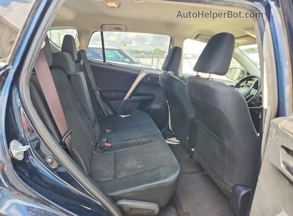 JTMBFREV4HJ714221 2017 TOYOTA RAV4 Black Vista interior trasera