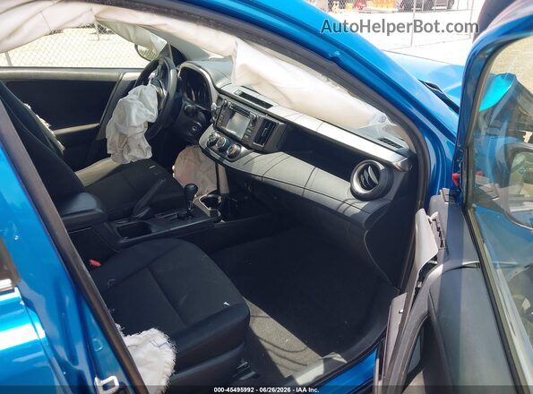 JTMBFREV5GJ076639 2016 TOYOTA RAV4 Синий Вид салона спереди