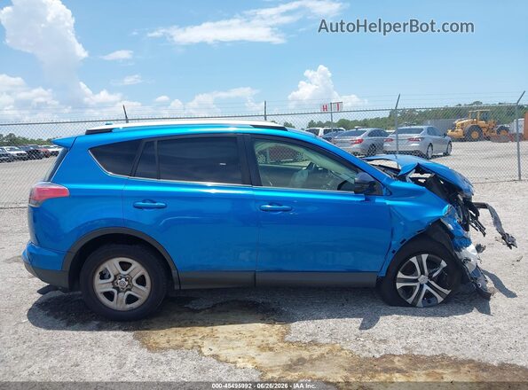 JTMBFREV5GJ076639 2016 TOYOTA RAV4 Синий Вид задней части салона