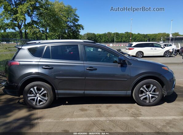 JTMBFREV5GJ080822 2016 TOYOTA RAV4 Серый Вид задней части салона