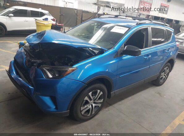 JTMBFREV5JJ717747 2018 TOYOTA RAV4 Blue Front left