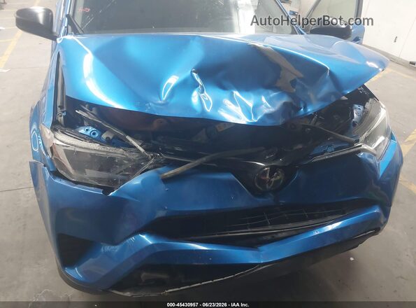 JTMBFREV5JJ717747 2018 TOYOTA RAV4 Blue Front view
