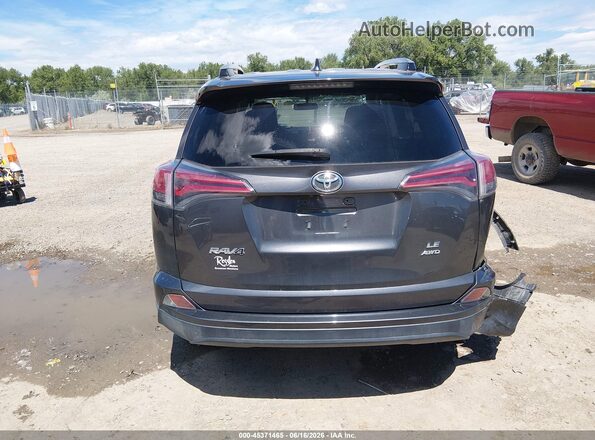 JTMBFREV6GJ085088 2016 TOYOTA RAV4 Gray 
