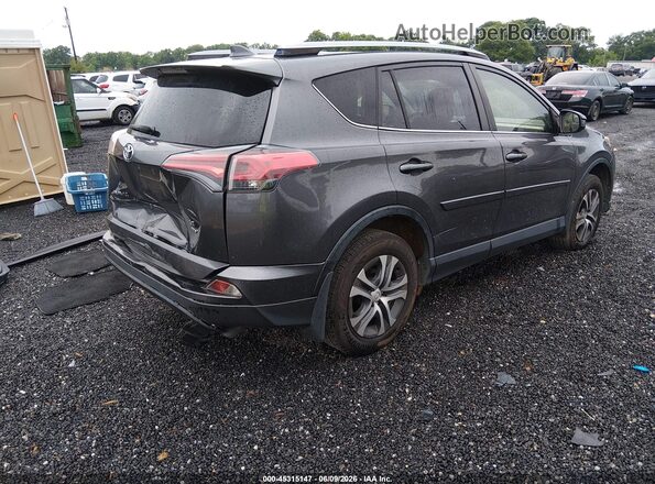 JTMBFREV6HJ131388 2017 TOYOTA RAV4 Gray Tył prawy