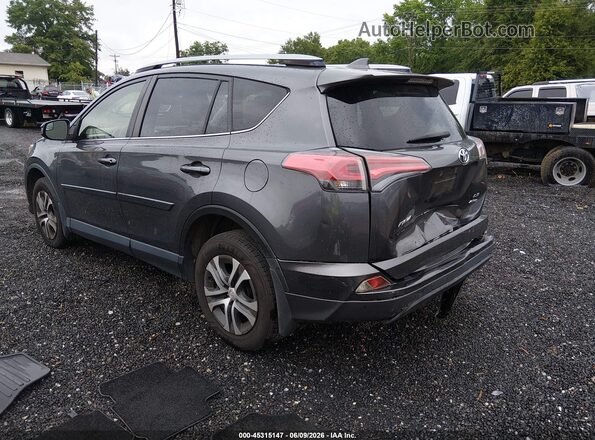 JTMBFREV6HJ131388 2017 TOYOTA RAV4 Gray Tył lewy