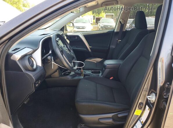JTMBFREV6JJ732824 2018 TOYOTA RAV4 Gray წინა სალონის ხედი