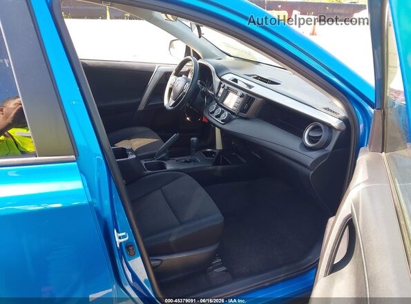 JTMBFREV6JJ734220 2018 TOYOTA RAV4 Blue Front interior view