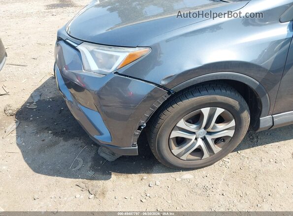 JTMBFREV7HD202323 2017 TOYOTA RAV4 Gray Вид спереду