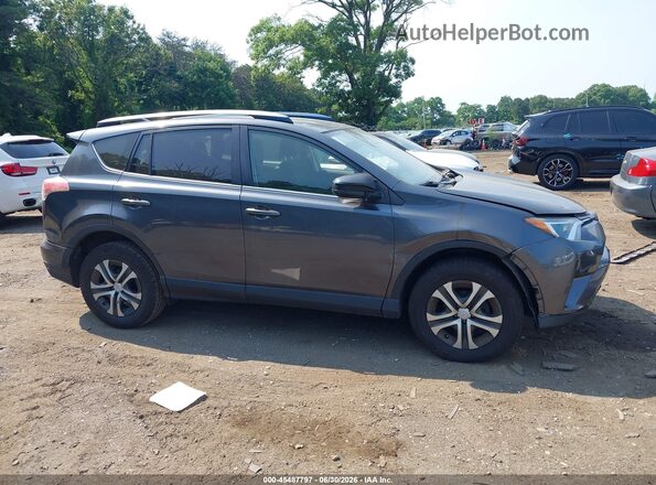 JTMBFREV7HD202323 2017 TOYOTA RAV4 Gray Вид задньої частини салону