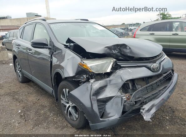 JTMBFREV7JJ178774 2018 TOYOTA RAV4 Gray Դիմացի տեսք