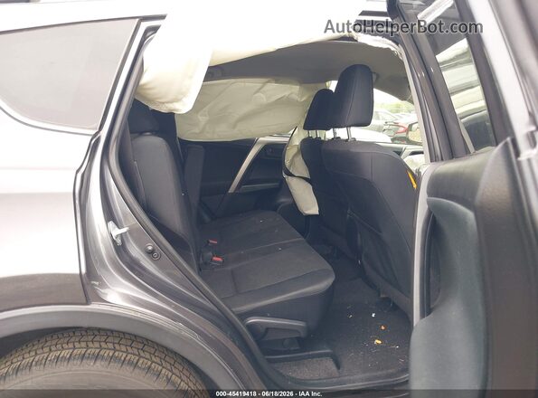 JTMBFREV7JJ178774 2018 TOYOTA RAV4 Gray VIN կոդի պիտակի տեսք