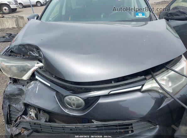 JTMBFREV7JJ178774 2018 TOYOTA RAV4 Gray Հետևի տեսք