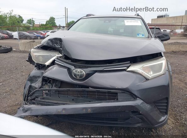 JTMBFREV7JJ178774 2018 TOYOTA RAV4 Gray Սարքավորումների վահանակի տեսք