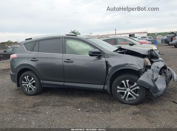 JTMBFREV7JJ178774 2018 TOYOTA RAV4 Gray Սալոնի հետևի տեսք