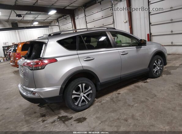 JTMBFREV8JD242383 2018 TOYOTA RAV4 Gray Trasero derecho