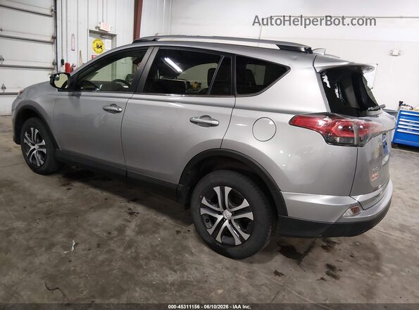 JTMBFREV8JD242383 2018 TOYOTA RAV4 Gray Trasero izquierdo