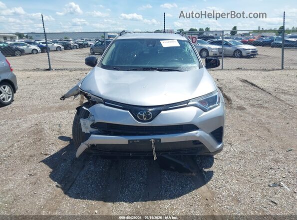 JTMBFREV8JJ194336 2018 TOYOTA RAV4 Silver Widok zestawu wskaźników