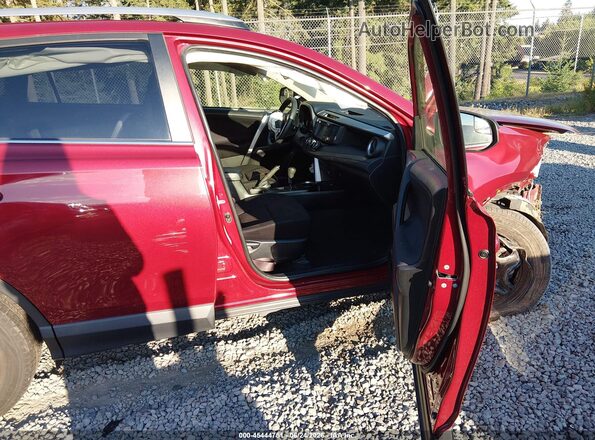 JTMBFREV9JD227035 2018 TOYOTA RAV4 Red წინა სალონის ხედი