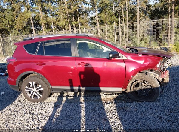 JTMBFREV9JD227035 2018 TOYOTA RAV4 Red უკანა სალონის ხედი