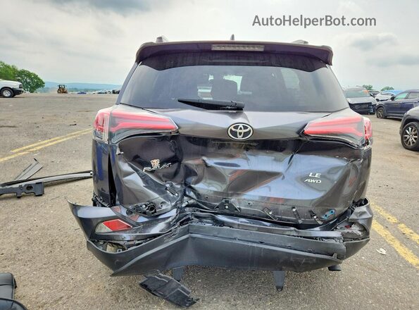 JTMBFREV9JJ216618 2018 TOYOTA RAV4 Gray Widok z tyłu