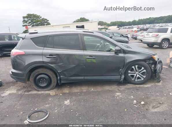 JTMBFREV9JJ734308 2018 TOYOTA RAV4 Gray Вид задньої частини салону