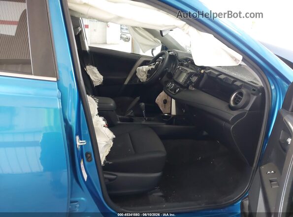 JTMBFREVXGJ068763 2016 TOYOTA RAV4 Синий Вид салона спереди