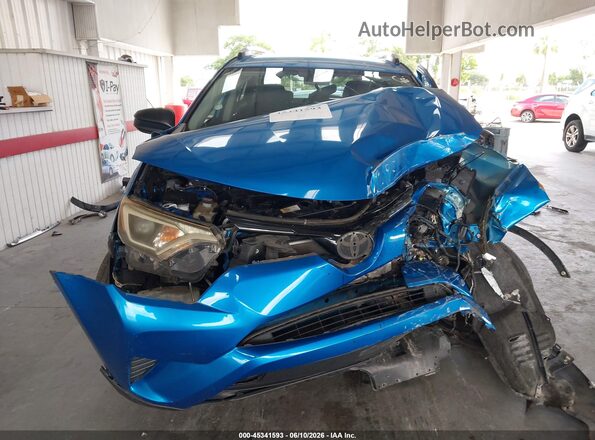 JTMBFREVXGJ068763 2016 TOYOTA RAV4 Синий Вид задней части салона