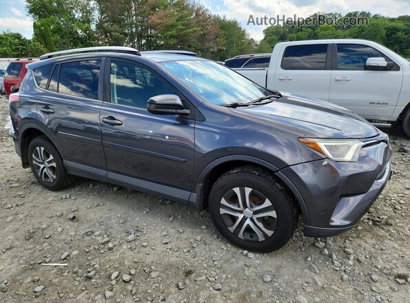 JTMBFREVXGJ076250 2016 TOYOTA RAV4 Gray Delantero derecho