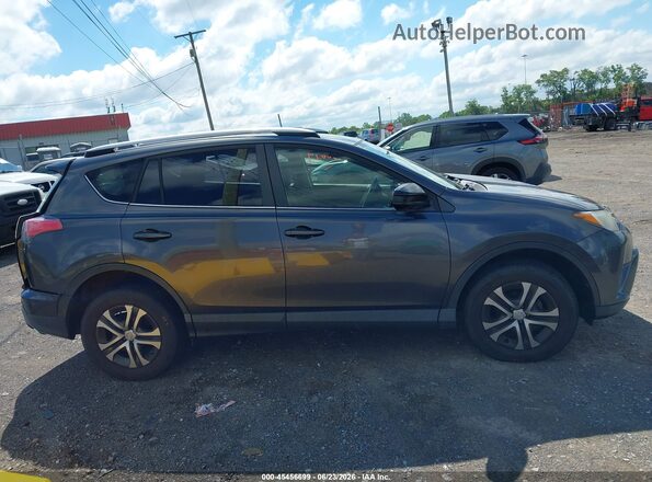 JTMBFREVXGJ102488 2016 TOYOTA RAV4 Серый Вид задней части салона