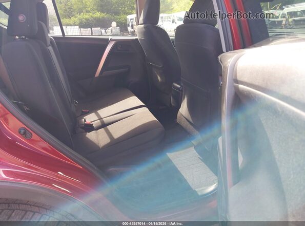 JTMBFREVXJD229862 2018 TOYOTA RAV4 Red VIN sticker view