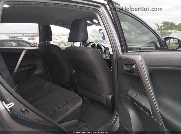 JTMBFREVXJJ725729 2018 TOYOTA RAV4 Gray Widok naklejki z numerem VIN