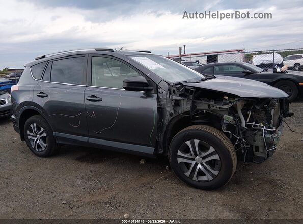 JTMBFREVXJJ725729 2018 TOYOTA RAV4 Gray Widok wnętrza z tyłu