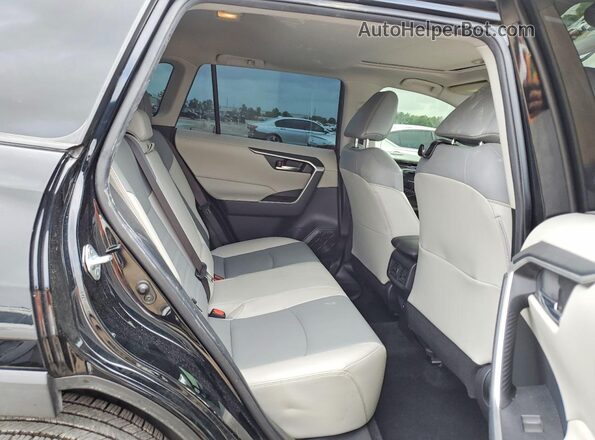 JTMC1RFV0KD514962 2019 TOYOTA RAV4 Black Vista interior trasera