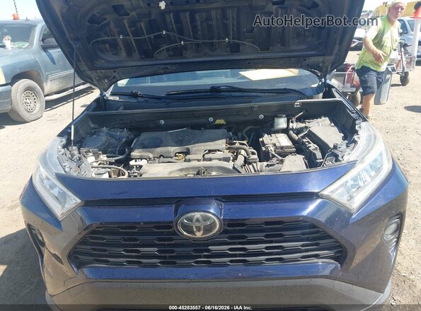 JTMC1RFV4KD511109 2019 TOYOTA RAV4 Blue Rear view