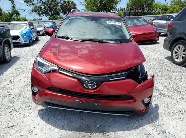 JTMDFREV0JD242094 2018 TOYOTA RAV4 Red Front view
